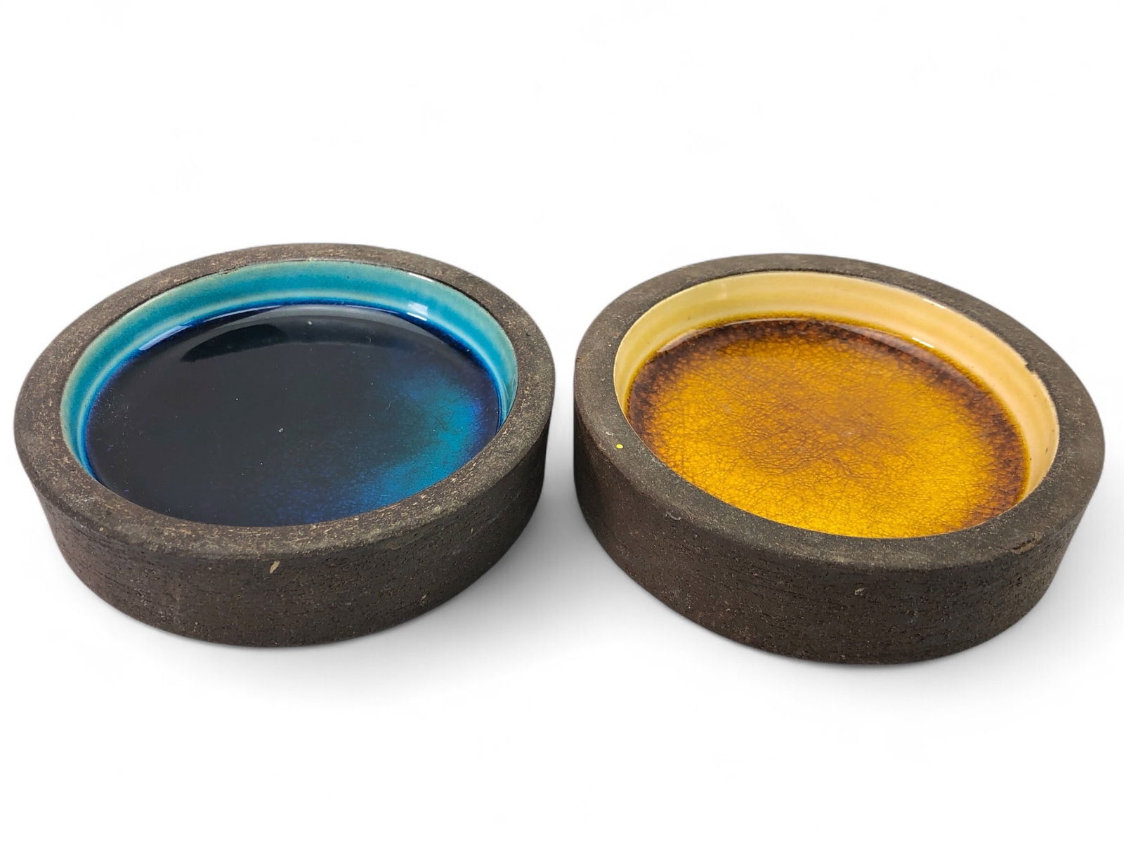 Rare MCM Richard Manz For Knapstrup Coasters: Danish mid-century modern coasters by Richard Manz for Knapstrup. Features fritte glaze glass & ceramic construction with a stamped 'Made in Denmark' mark. Each coaster measures approximately 4 inches