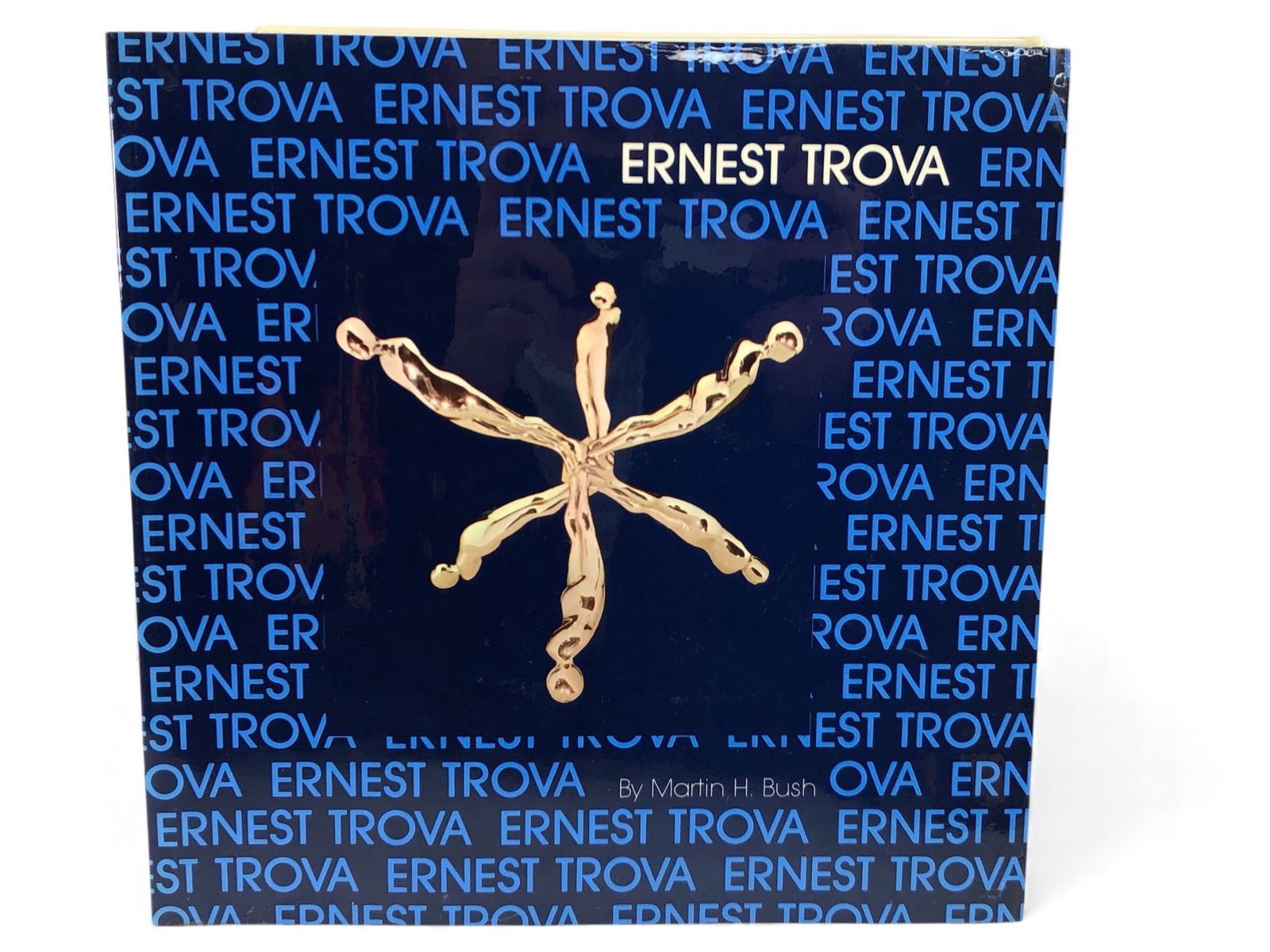 Ernest Trova 1977 First Edition Softcover: Rare 1977 first edition softcover book on Ernest Trova, published by Wichita State University. Features 123 illustrations and a comprehensive bibliography of his work. Authored by Martin H. Bush. Meas