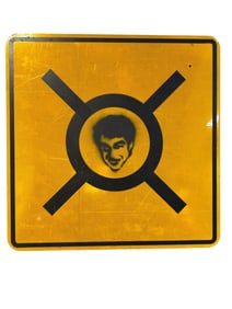 Stencil Graffitied Reflective Traffic Sign