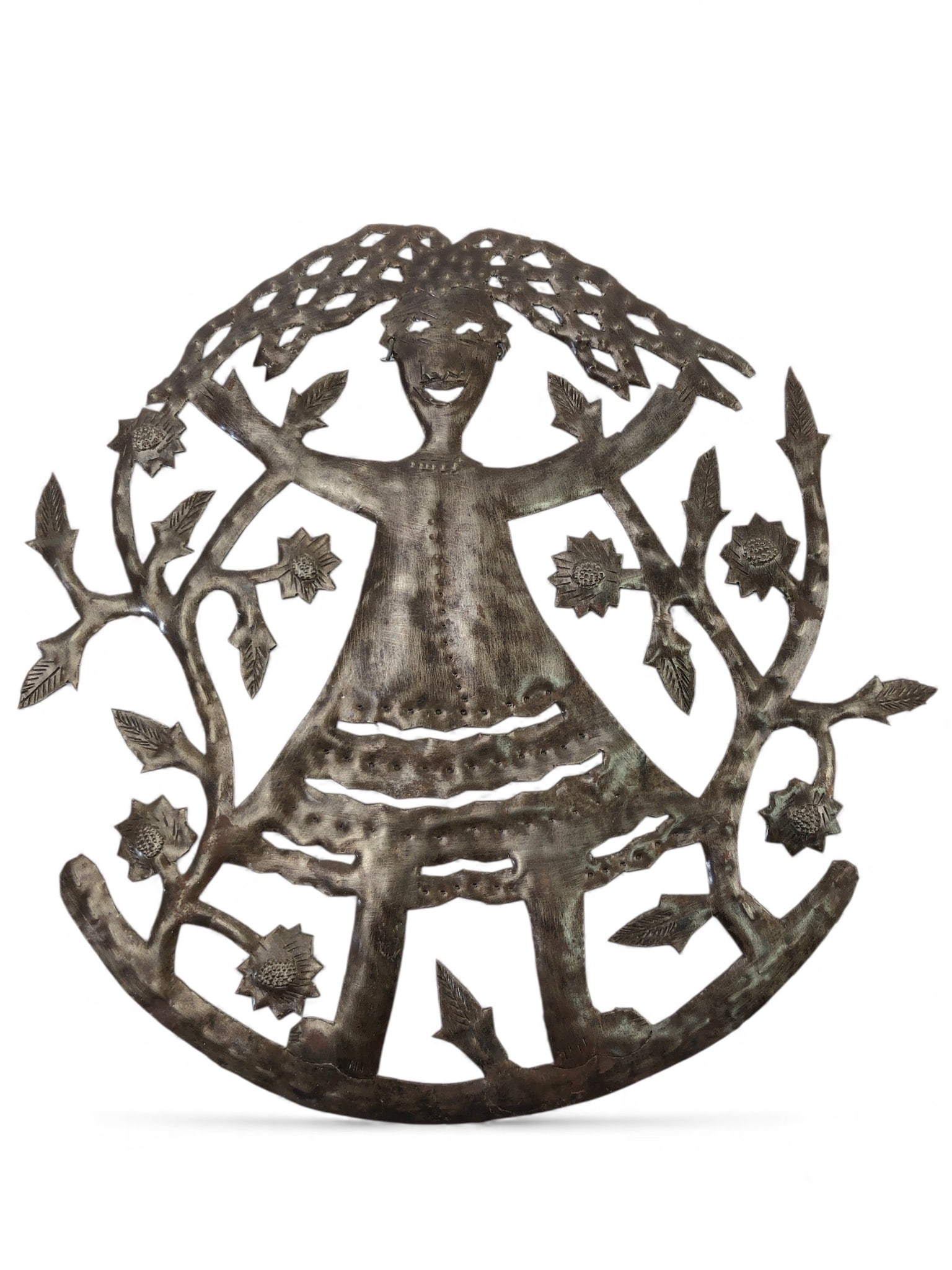 Haitian Metal Folk Art Oil Barrel: Haitian folk art piece handcrafted from recycled oil barrels. Depicts a figure surrounded by floral motifs. Made of metal with a diameter of 15 inches. Marked "Made in Haiti." Unique design, showcasin