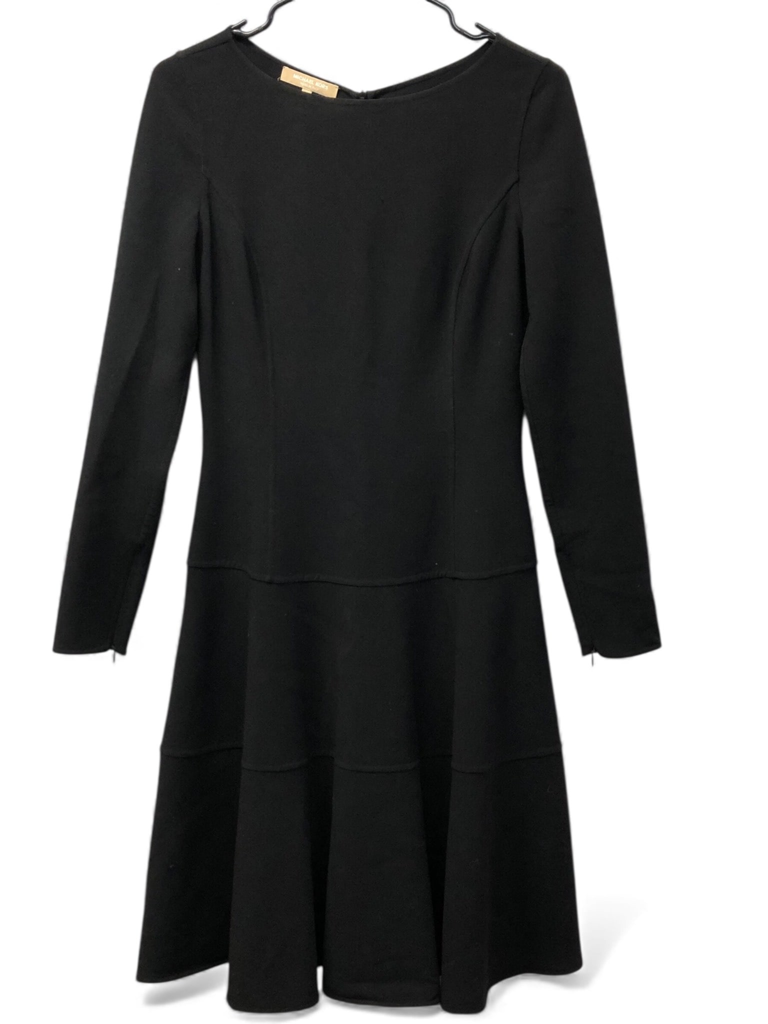 Michael Kors Black Wool Blend Dress: Michael Kors black wool blend dress, size 6, made in Italy. Features long sleeves, a zip closure at the back, and a flared skirt design. Fabric composition: 90% virgin wool, 10% elastane. Clean lining