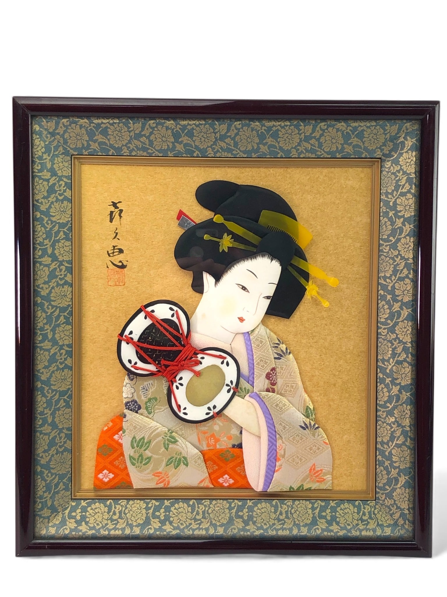 Japanese Oshi-e Padded Textile Collage By Kuhisa: Japanese Oshi-e padded textile collage depicting a woman holding a Tsuzumi drum. Signed Kuhisa. Framed with dimensions 14.25 x 13 1/8 inches. Features intricate textile work & vibrant colors. Frame in