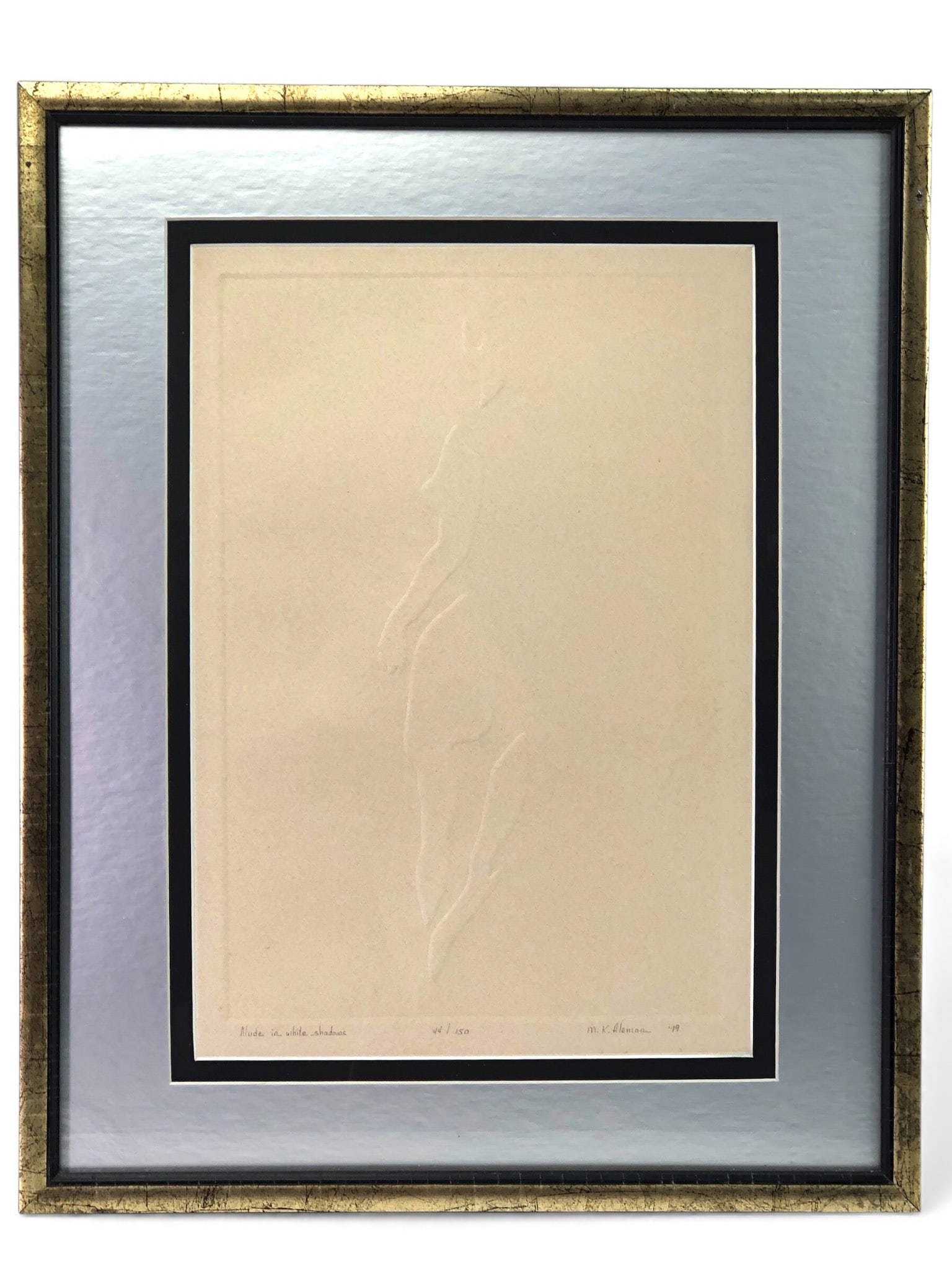 M.K. Aleman “Nude In White Shadows?? Embossed Print: Limited edition embossed print titled “Nude in White Shadows” by M.K. Aleman, dated ’79. Edition number 44/150. Framed artwork measures 22 x 18 inches. Features a simple and elegant depictio