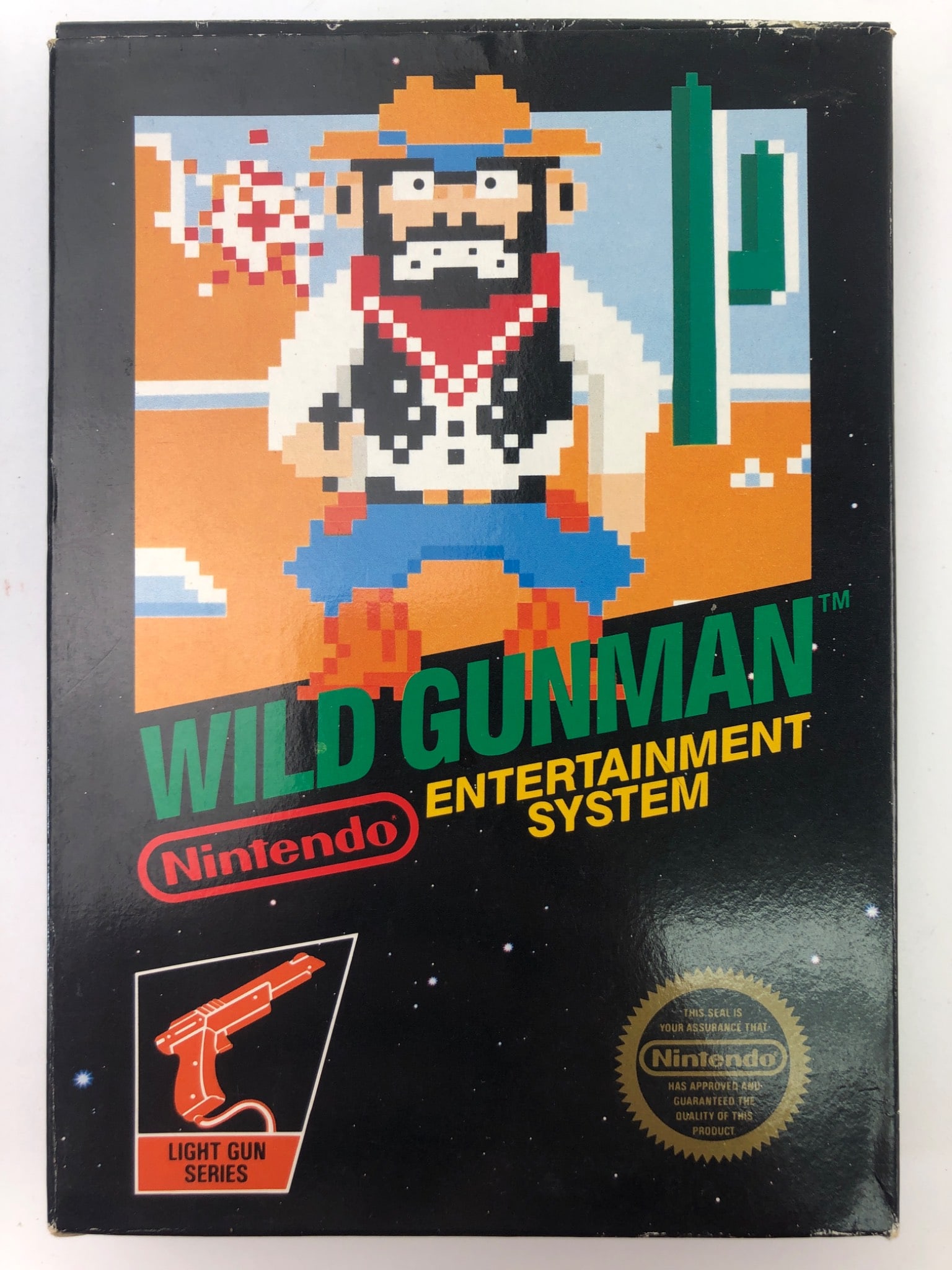 Wild Gunman Nintendo Entertainment System: Wild Gunman for the Nintendo Entertainment System (NES) includes the cartridge, original box, instruction booklet, & protective black cartridge sleeve. The box shows signs of wear, & the instruction b
