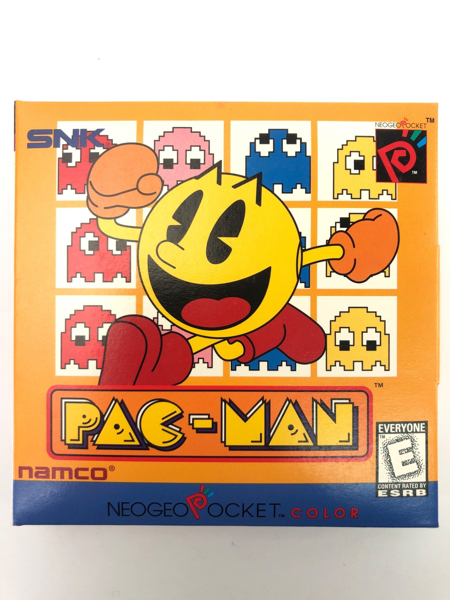 Pac-Man NeoGeo Pocket Color Game: Pac-Man by Namco for NeoGeo Pocket Color. Includes box, cartridge, and manual. Box features vibrant artwork with Pac-Man & ghosts. Cartridge labeled NEOP00551, made in Japan. Rated Everyone by ESRB. O