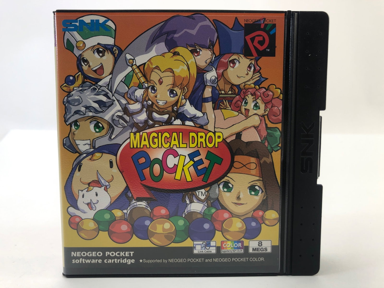 Magical Drop Pocket By Data East For SNK NeoGeo: Magical Drop Pocket game cartridge by Data East for the SNK NeoGeo Pocket. Includes original cartridge, case, manual, and artwork. Released in 1999, made in Japan. Distributed by SNK Corporation. Desi
