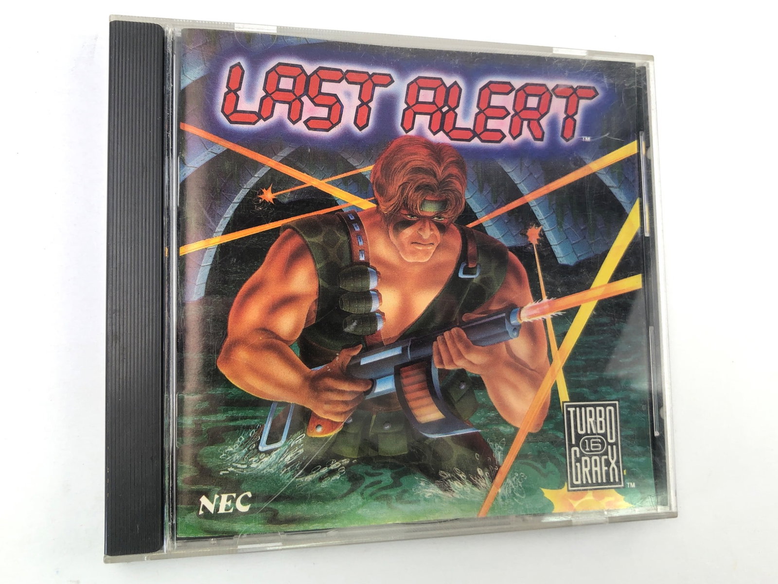 Last Alert NEC TurboGrafx-16 CD Game: Last Alert game published by NEC for the TurboGrafx-16 CD console. Includes original jewel case, manual, & game disc. Visible surface wear present on jewel case & minor scratches on the disc. Game is 