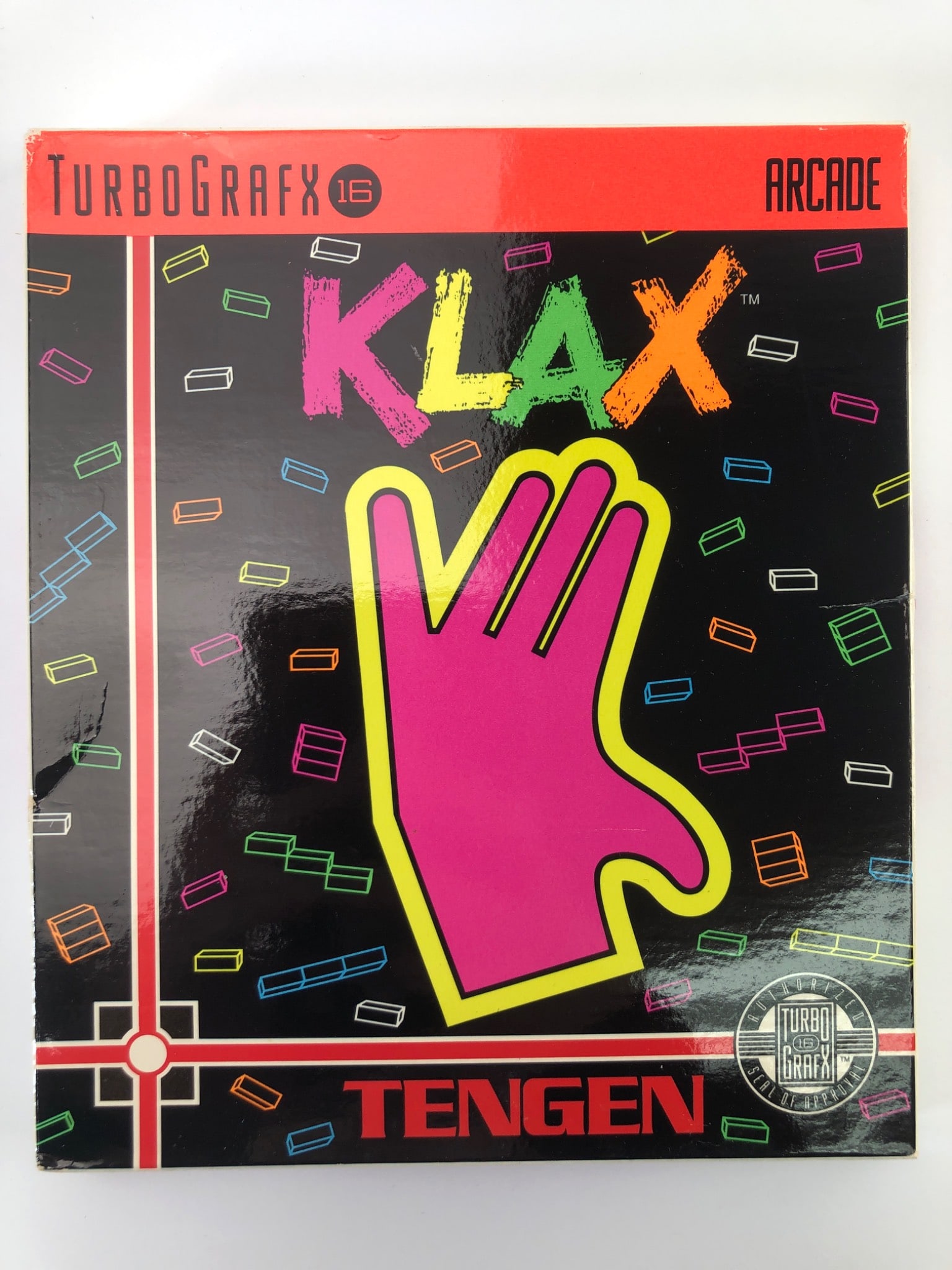 TurboGrafx-16 Klax By Tengen Arcade Game: TurboGrafx-16 Klax arcade game by Tengen, released in 1990. Includes original box, game card (HuCARD), jewel case, & instruction manual. Box shows minor wear with slight creasing & a small scuff on th