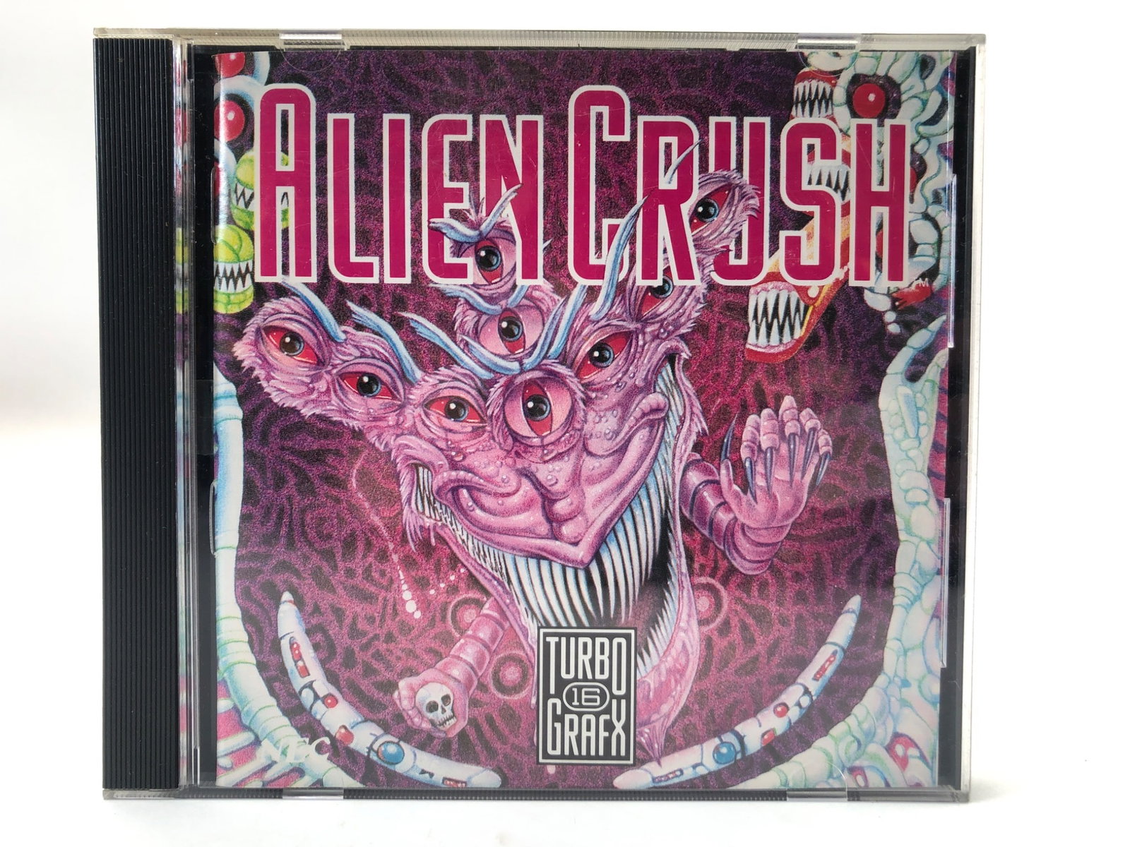 Alien Crush TurboGrafx-16 HuCard Game: Alien Crush TurboGrafx-16 HuCard game, developed by Hudson Soft in 1989. Includes HuCard, original case, manual, & artwork. Case shows wear on the back, otherwise the contents are intact. Highly colle