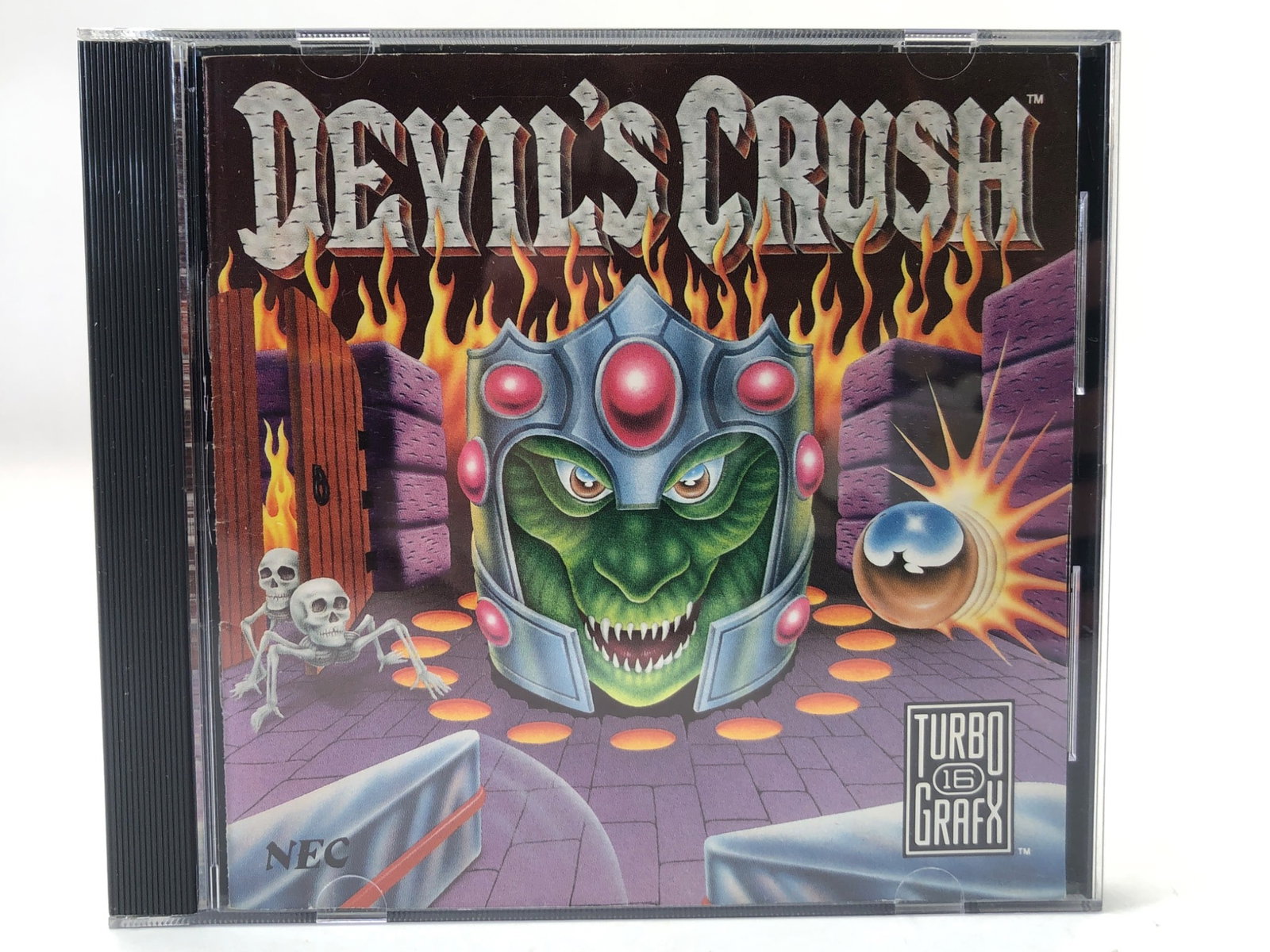 Devil’s Crush TurboGrafx-16 Game W/ Manual: Devil's Crush video game for the TurboGrafx-16 console, published by NEC in 1990. Includes the original HuCard, protective case, outer box, and instruction manual. The box and materials show minor wea