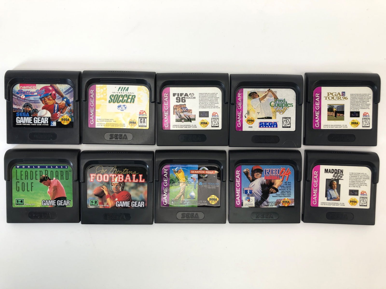 10 Sega Game Gear Sports Games Lot: 10 Sega Game Gear sports game cartridges including titles like FIFA 96 Soccer, Madden 96, PGA Tour 96, World Class Leaderboard Golf, and more. All are loose cartridges without original boxes or manual