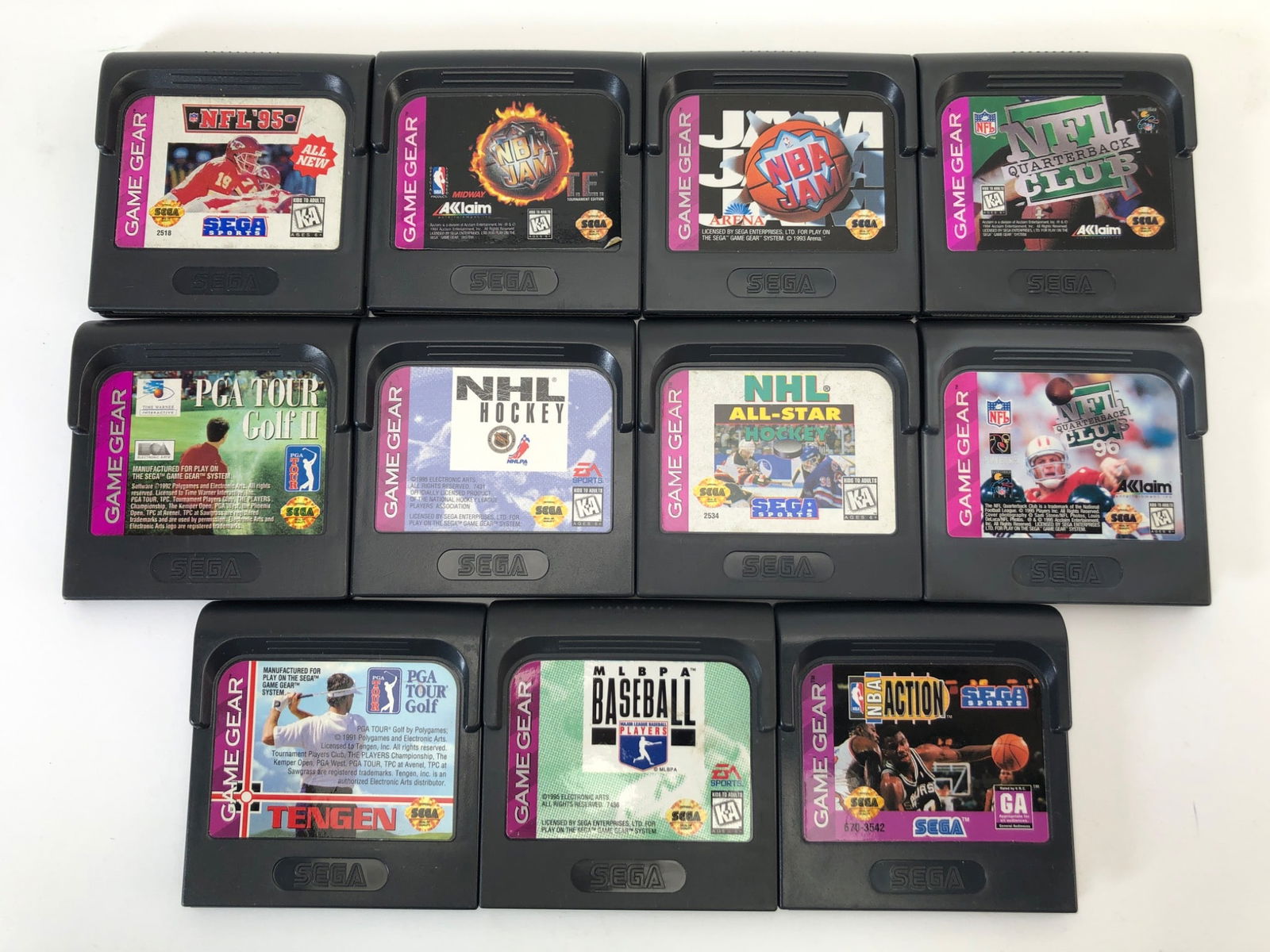 Sega Game Gear Sports Games Lot Of 11: 11 Sega Game Gear sports game cartridges, featuring titles such as NBA Action, NHL All-Star, NFL ’95, PGA Tour Golf, & more. Games show general signs of use. No documentation or original packaging i