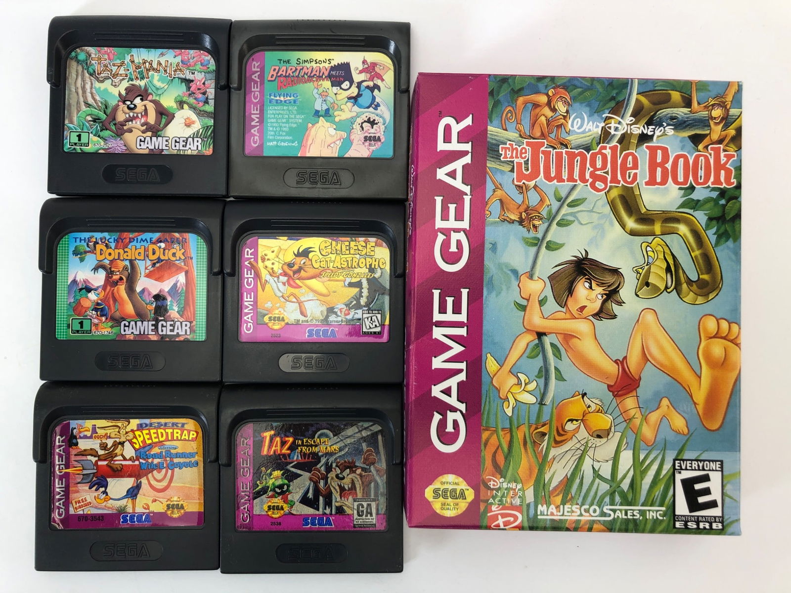Sega Game Gear Kids Games Incl. Jungle Book: 7 Sega Game Gear kids' games including complete 'The Jungle Book' with box & manual. Other titles: The Simpsons, Donald Duck, Cliffhanger, SpeedTrap, Taz-Mania, & Chessmaster. All cartridges in used c