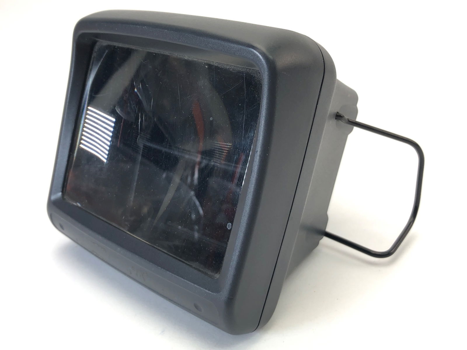 Sega Game Gear Super Wide Attachment: Sega Game Gear Super Wide Gear magnifier attachment for the Game Gear console. Designed to enhance the screen size for improved viewing. Constructed with durable plastic. Features foldable metal suppo