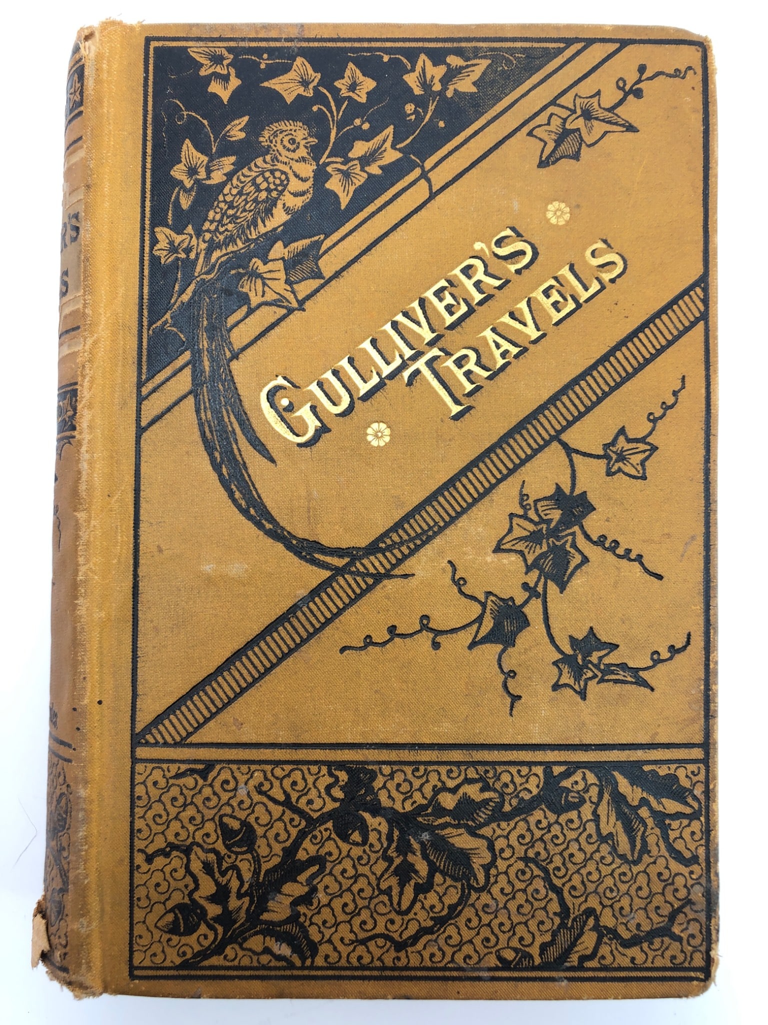Gulliver’s Travels 1877 Illustrated Edition: Extremely rare 1877 illustrated hard cover edition of 'Gulliver's Travels' by Jonathan Swift. Published by Porter & Coates, Philadelphia. Features ornate cover design with gilded title text. Some wear