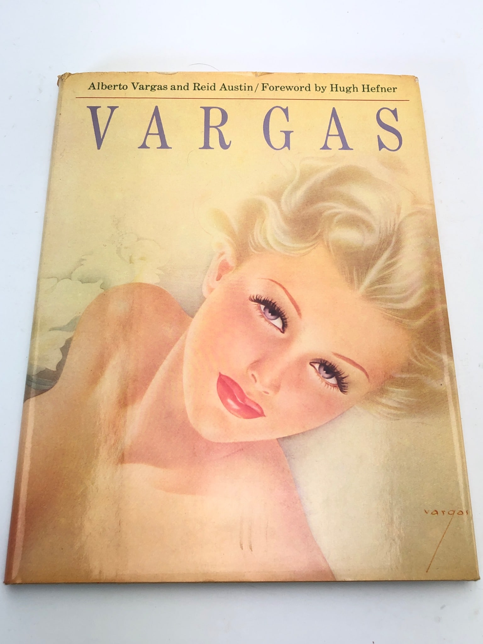 Vargas By Alberto Vargas & Reid Austin: 1978 first edition hardcover book titled "Vargas" by Alberto Vargas & Reid Austin, featuring a foreword by Hugh Hefner. Includes dust jacket with some wear & a tear on the interior flap. Published by