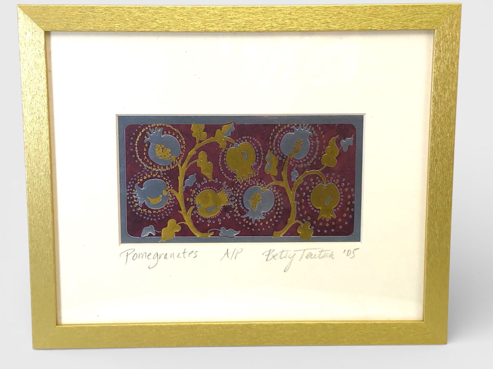 Betsy Teutsch Pomegranates 2005 A/P Art Print: Betsy Teutsch art print titled 'Pomegranates,' marked A/P (Artist's Proof) and dated 2005. Judaica-themed design featuring gold and blue pomegranates on a maroon background. Includes a gold-tone