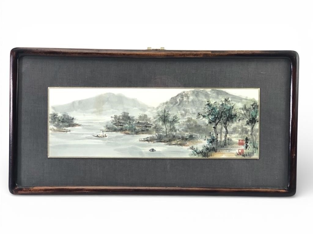 Vtg Asian Landscape Watercolor 19.25 x 9.75: Vintage Asian landscape watercolor painting enclosed in a wooden frame measuring 19.25 x 9.75 inches. Features a serene depiction of trees, mountains, & water with red artist stamps & inscriptions. In