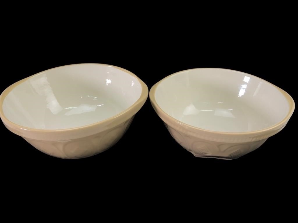 T.G. Green Pottery Earthenware Gripstand Bowls: Pair of traditional earthenware gripstand mixing bowls by T.G. Green Pottery, made by Cloverleaf for Furio Home. Features a cream-colored glazed interior and a tan-colored exterior with a classic embo