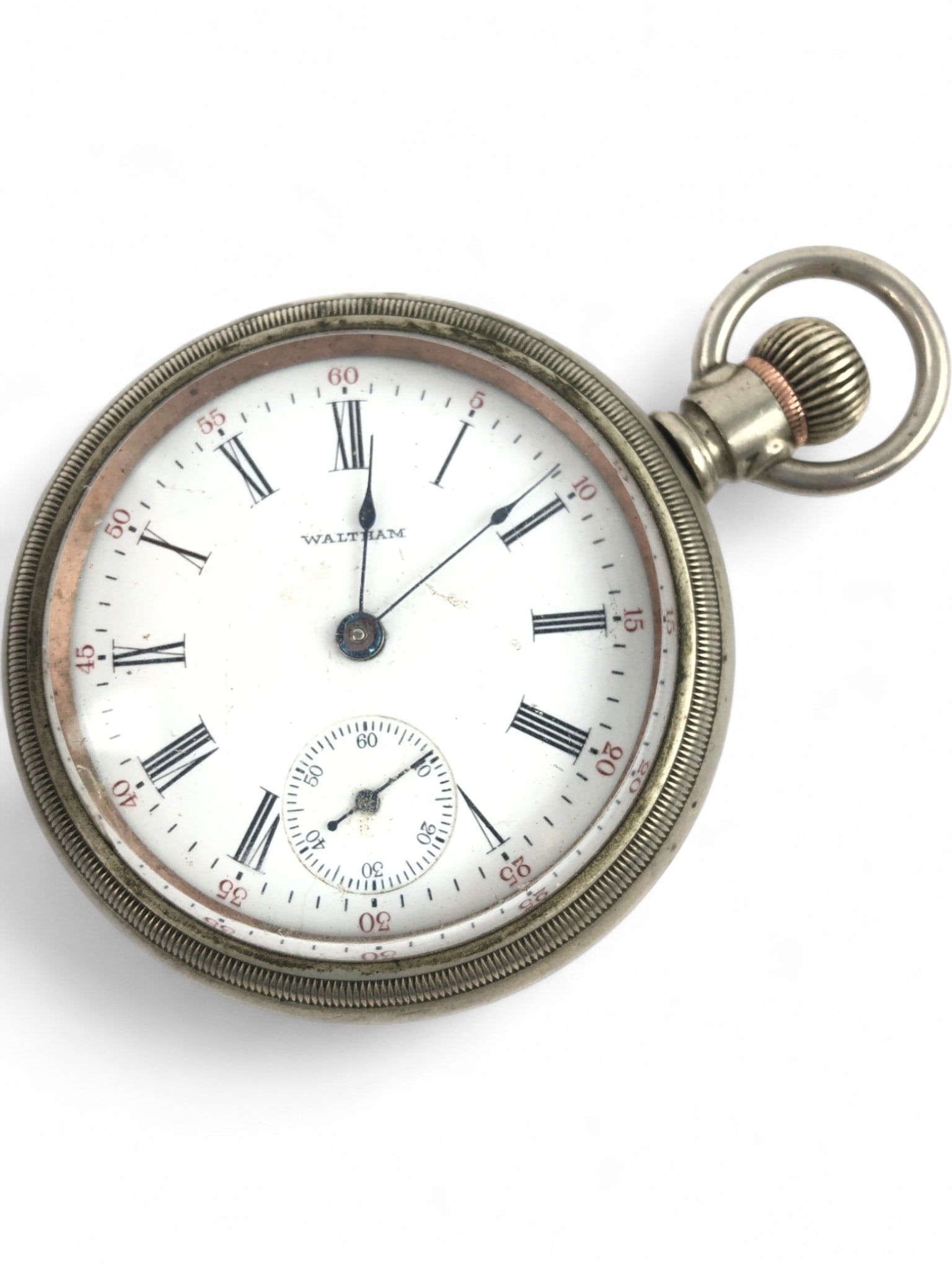 Waltham Open Face Pocket Watch: Antique Waltham open face pocket watch featuring a white enamel dial with Roman numeral hour markers, a sub-seconds dial at the 6 o'clock position, and red outer minute track. The watch is housed in a