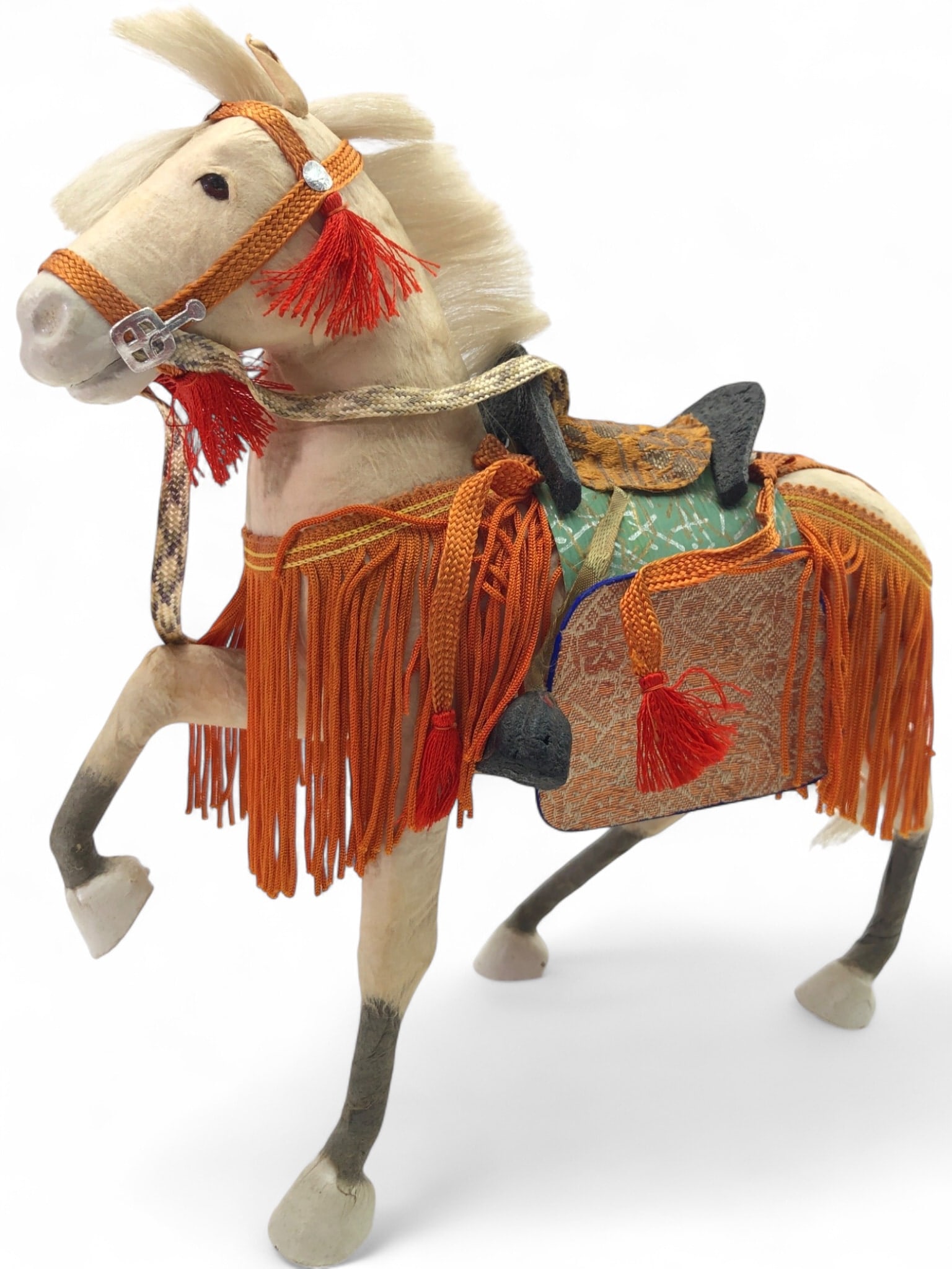 VTG Japanese Paper Mache Festival Horse, c. 1950s: Vintage Japanese paper mache festival horse, c. 1950-1960. Hand-painted figure featuring elaborate textile trappings including orange silk fringe, brocade saddle cloths, and red tassels. Constructed w
