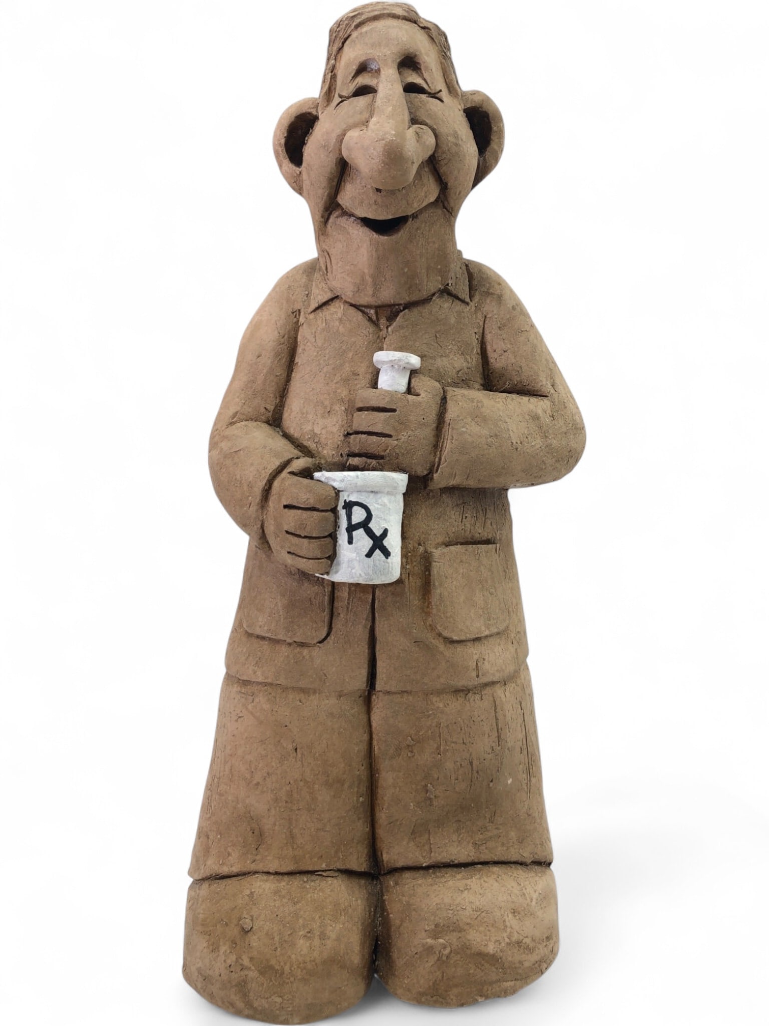 Connelly Signed Studio Pottery Pharmacist Figure: Hand-sculpted studio pottery figure of a smiling pharmacist holding a mortar and pestle with 'Rx' detail. Created from a coarse, textured brown stoneware or earthenware clay with a hollow interior.