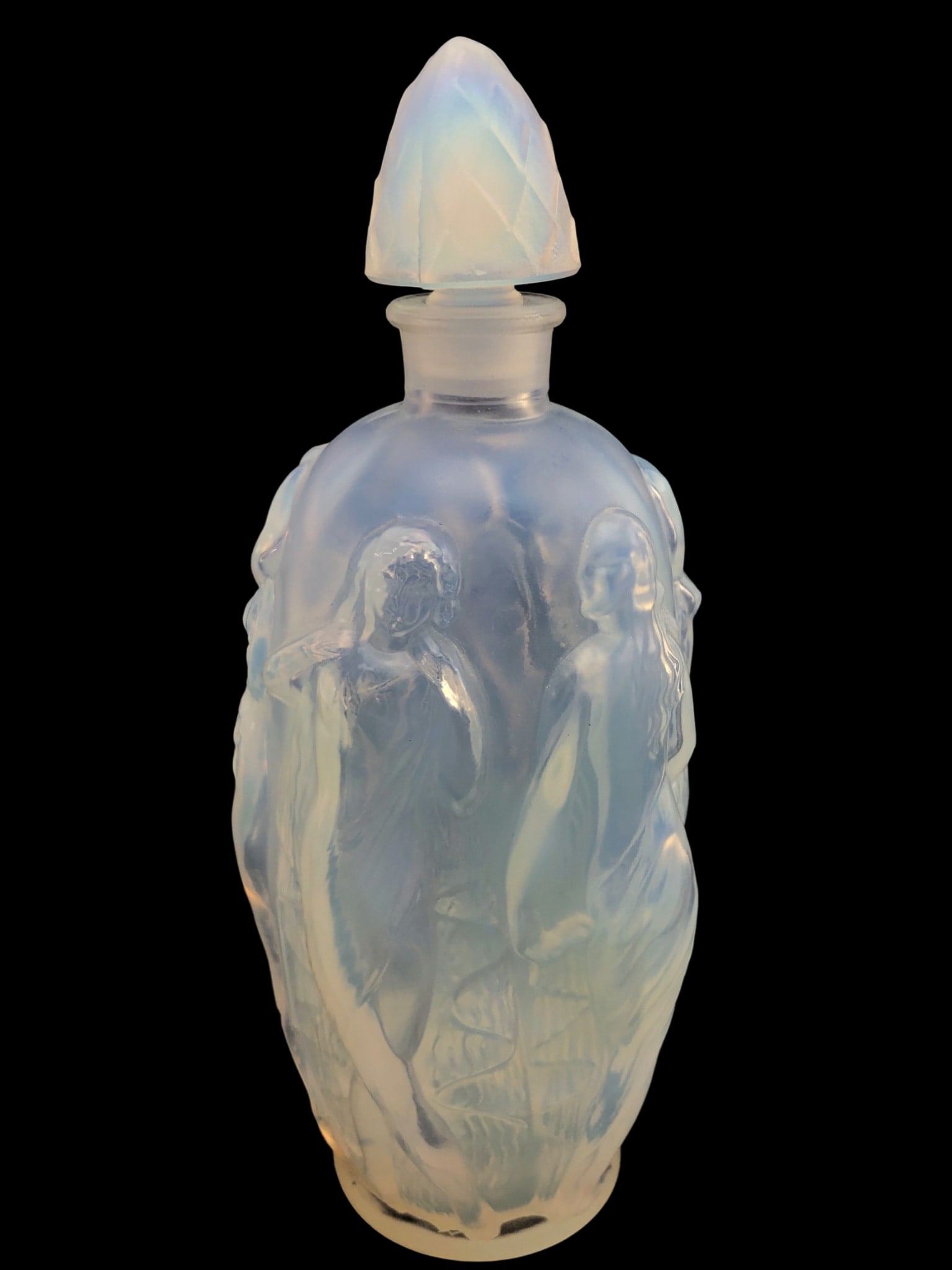 Sabino Paris Opalescent Glass Perfume Bottle: Art Deco style opalescent glass perfume bottle by Sabino, Paris. The body features a continuous relief of classical female figures. Topped with a coordinating faceted stopper. Signed 'Sabino Paris' in