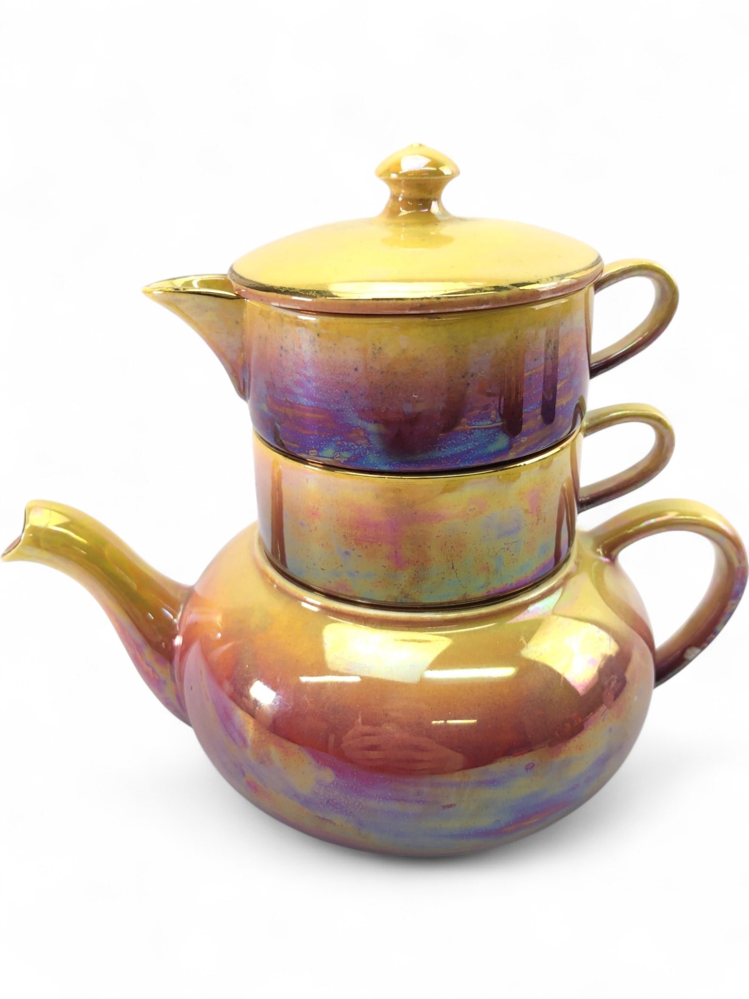VTG Royal Winton Grimwades Lusterware Stacking Teapot: Vintage Royal Winton Grimwades lusterware stacking tea-for-one set. Includes a teapot, creamer, and sugar bowl with lid. Features a vibrant iridescent orange and purple luster glaze over a ceramic bod