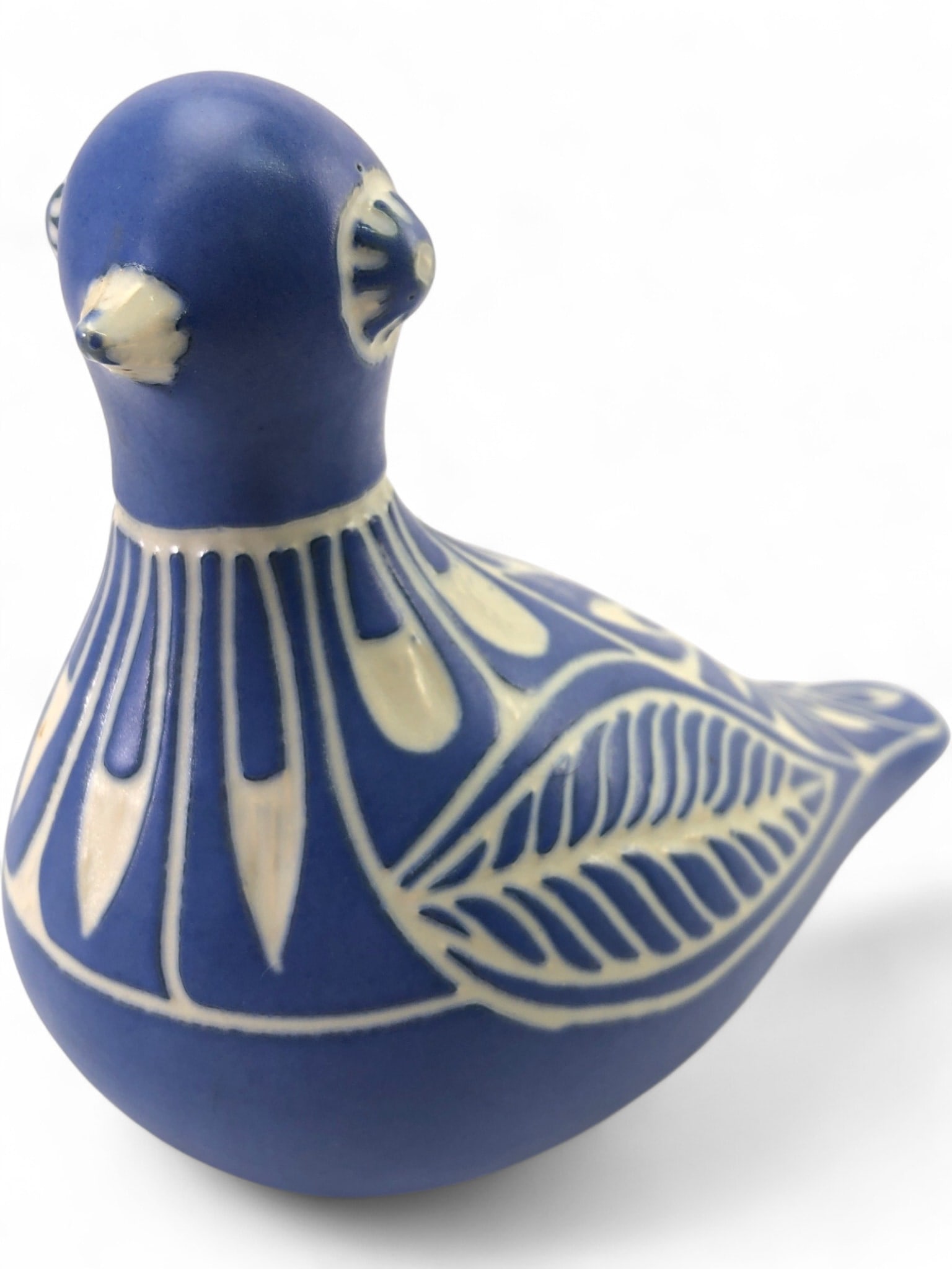 VTG Pablo Zabal Chilean Folk Art Ceramic Bird: Vintage Chilean folk art bird figurine by Pablo Zabal. This hand-painted earthenware piece features a vibrant blue matte glaze with sgraffito-style white floral and leaf motifs. Signed "Pablo Zabal
