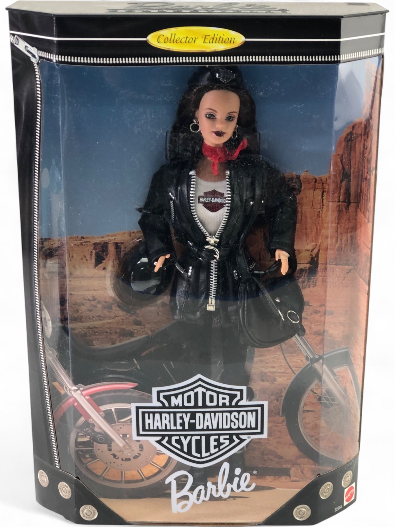 Mattel Harley-Davidson Barbie Doll Collector Edition: NIB Harley-Davidson Barbie doll, Collector Edition, No. 22256. Produced by Mattel in 1998. Features Barbie in a black faux-leather biker outfit with Harley-Davidson branding, red scarf, and accessorie