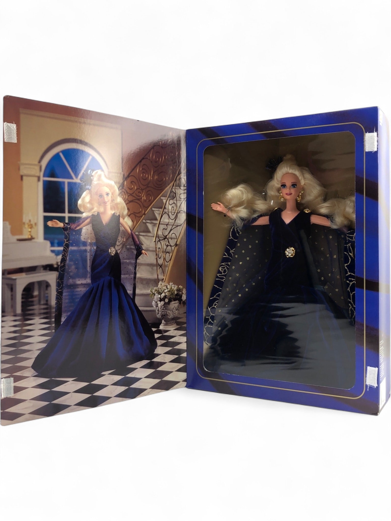 Mattel Sapphire Dream Barbie Doll NRFB: Sapphire Dream Barbie doll, first in the Society Style Collection series by Mattel. This limited edition doll features a deep blue velvet-like gown with a sheer, gold-accented cape and a sparkling