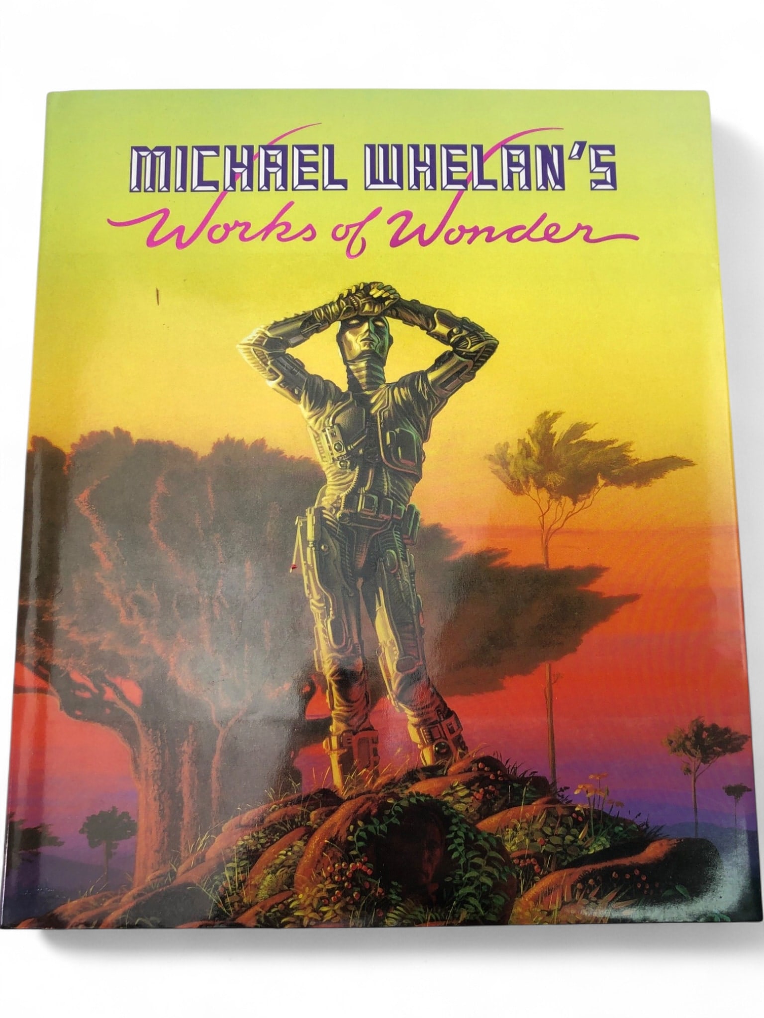 Michael Whelan's Works of Wonder Hardcover Book: Michael Whelan's Works of Wonder, text by Michael Whelan, foreword by Isaac Asimov. Published by Del Rey / Ballantine Books, New York. 1987 first edition, second printing (indicated by number line 10 
