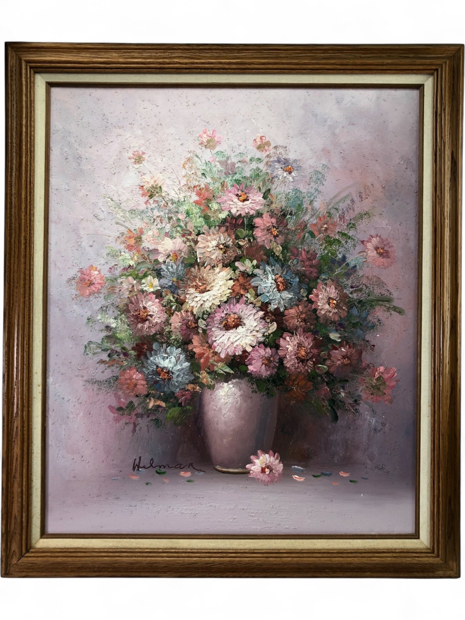 Helman Signed Floral Still Life Oil on Canvas: A large-scale oil on canvas still life painting depicting a lush bouquet of flowers in a vase, signed 'Hilman' in the lower left. The work features heavy impasto texture and a soft pastel color palett