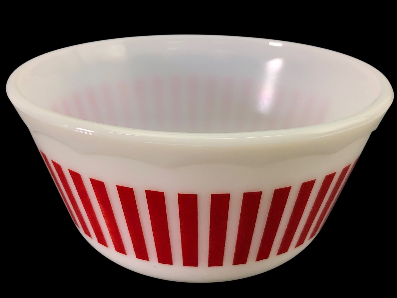 VTG Hazel Atlas Red Candy Stripe Milk Glass Bowl: Vintage milk glass mixing bowl by Hazel Atlas featuring a red candy stripe pattern and a distinctive scalloped upper rim. The bowl is made of white opaque milk glass with a series of vertical red stri