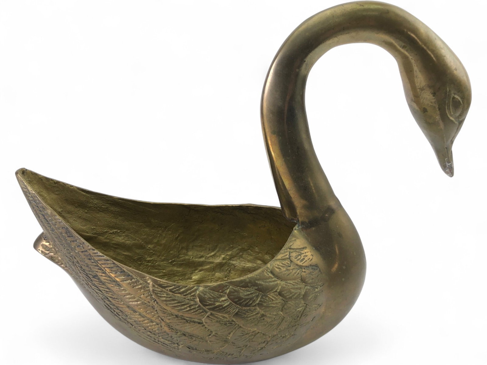 VTG Brass Swan Dish, 10" Tall: VTG brass swan dish, 10" tall. This decorative piece features a graceful, curved neck and head, with detailed feathering embossed on the body. The open back forms a functional bowl, suitable as a plan
