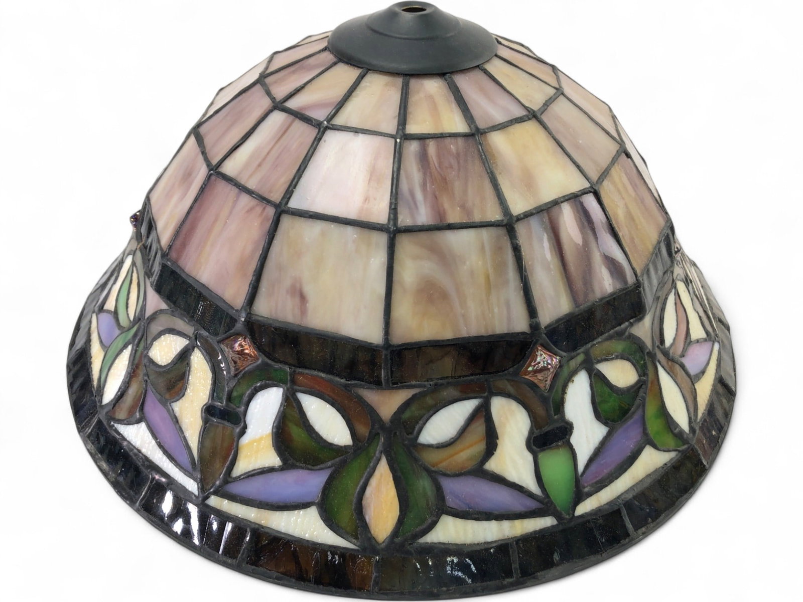 Tiffany-Style Stained Glass Lamp Shade, 14" Dia.: Unmarked Tiffany-style stained glass lamp shade. Features a domed form with a geometric upper section in swirled cream and purple glass, transitioning to a lower band with intricate floral and