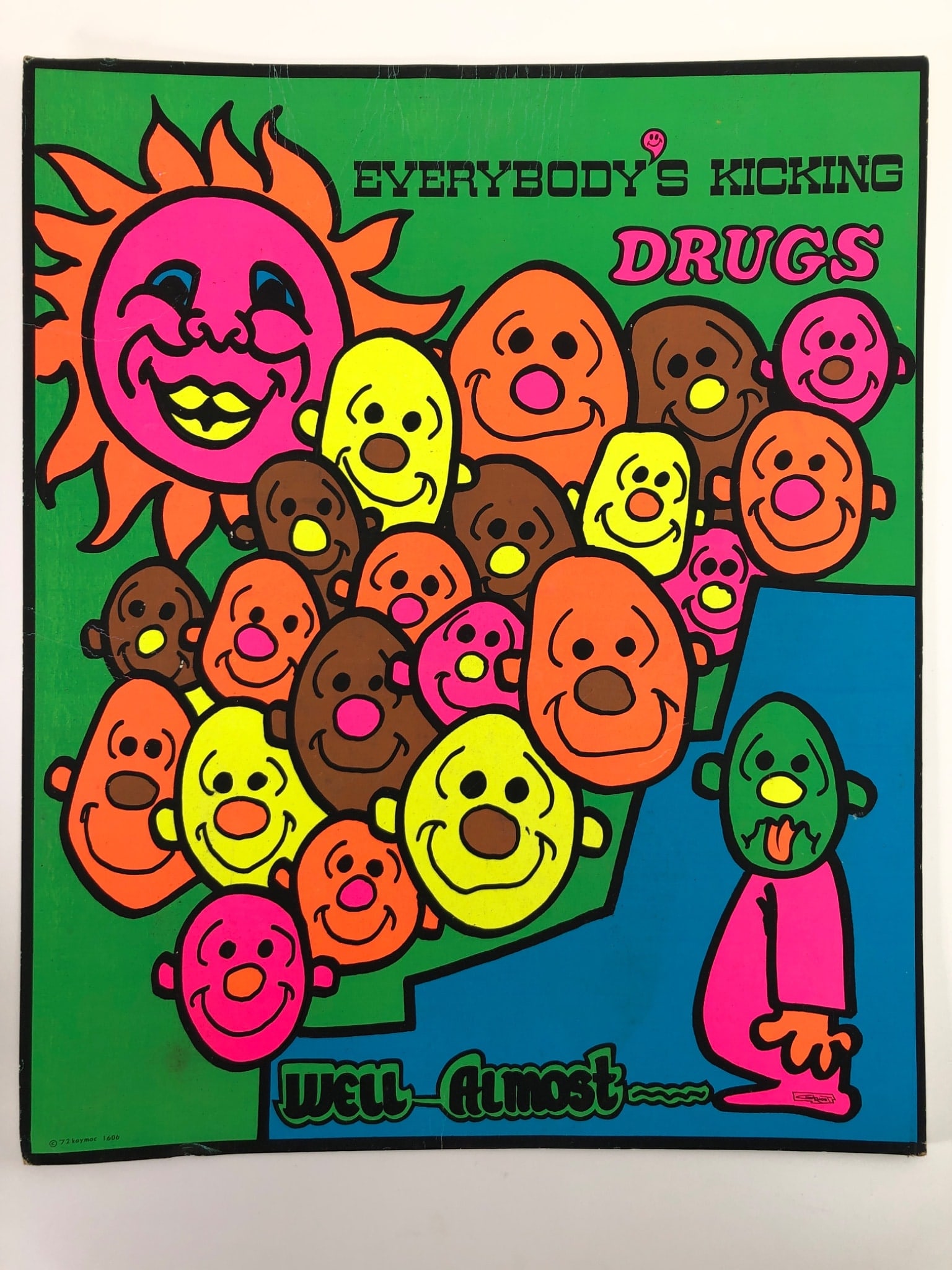 VTG Kaymac "Everybody's Kicking Drugs" Poster: Vintage blacklight poster by Kaymac Distribution Systems, Inc., c. 1972. Features a smiling sun and various faces with the slogan "EVERYBODY'S KICKING DRUGS Well - Almost". Blacklight sensitive.