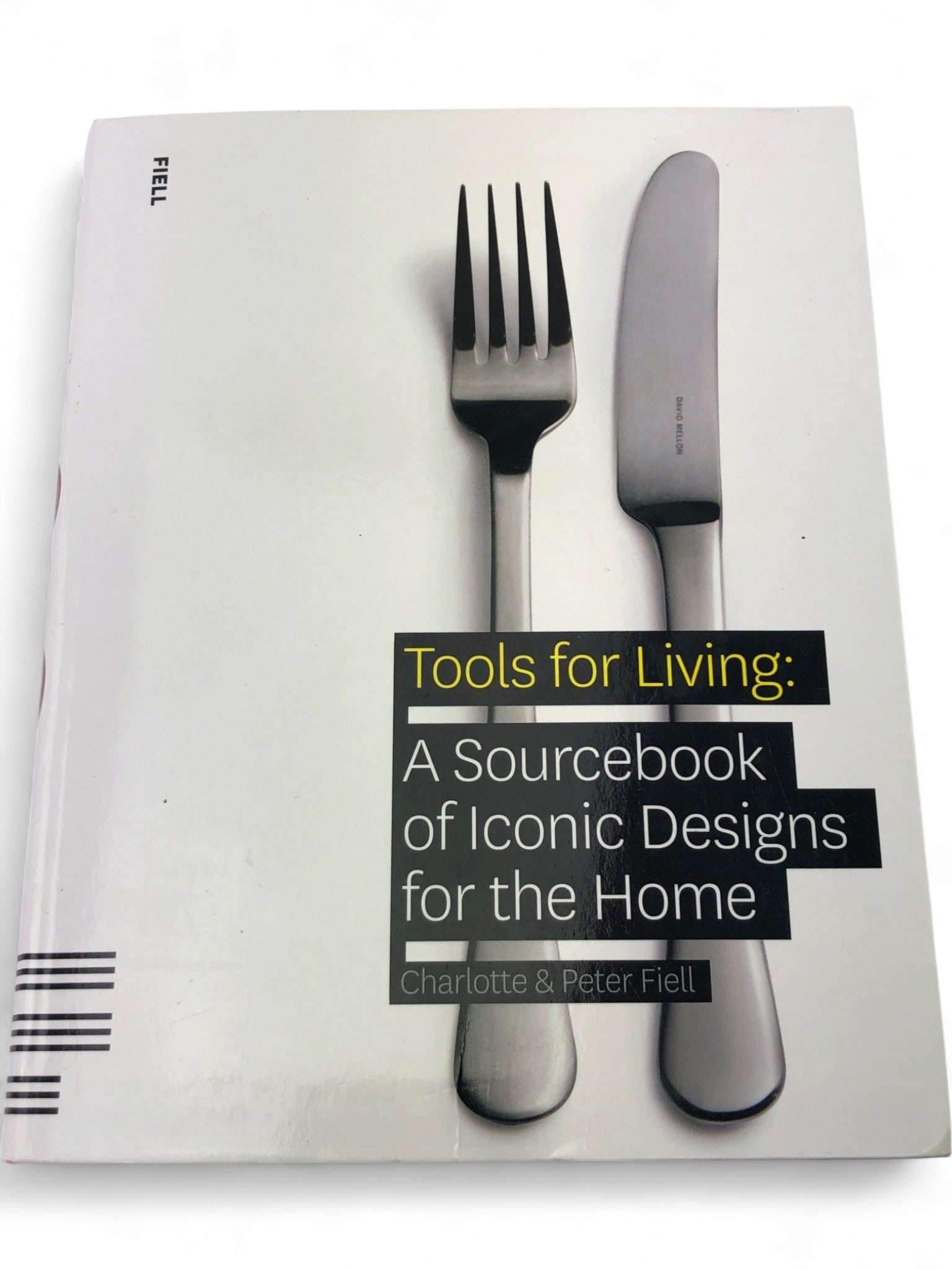 Fiell Publishing Tools for Living Softcover Book: 2010 first edition soft cover book, 'Tools for Living: A Sourcebook of Iconic Designs for the Home' by Charlotte & Peter Fiell, published by Fiell Publishing. Printed in China. Showcases well-designed