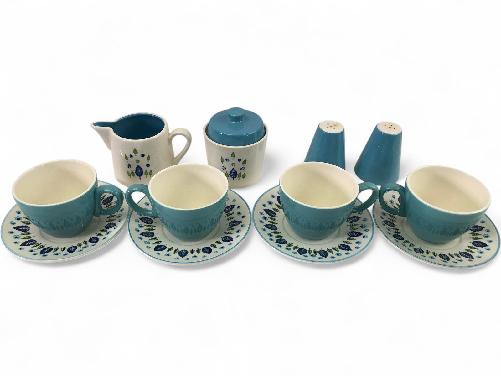 VTG Marcrest Swiss Alpine Breakfast Set: VTG Marcrest Swiss Alpine breakfast table set. This 8-piece ceramic set includes a sugar bowl with lid, creamer, pr. salt & pepper shakers, and 4 cups with matching saucers. The off-white pieces featu