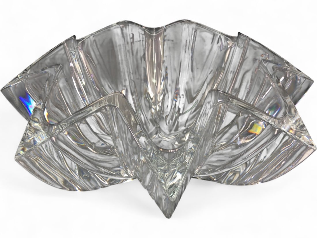 Cristal D'Arques France Star-Shaped Crystal Bowl: Cristal D'Arques faceted crystal bowl, made in France. Features a brilliant clear glass construction with a distinctive star-shaped design and wavy, geometric sides. Marked 'CDA' on base, consistent w