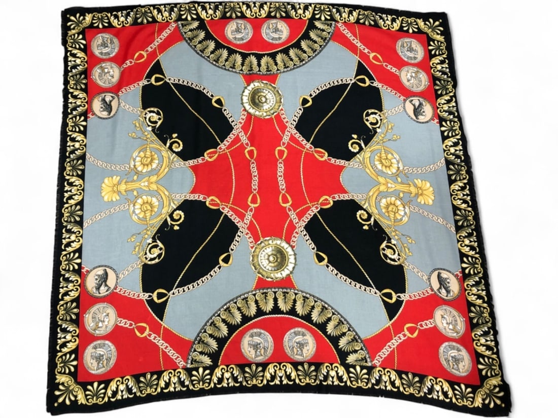 Ornate Classical Medallion Print Scarf: An ornate classical style scarf, unmarked, likely a silk or synthetic blend textile. Features a vibrant red, grey, and black ground with gold chain, floral, and medallion motifs depicting classical fi