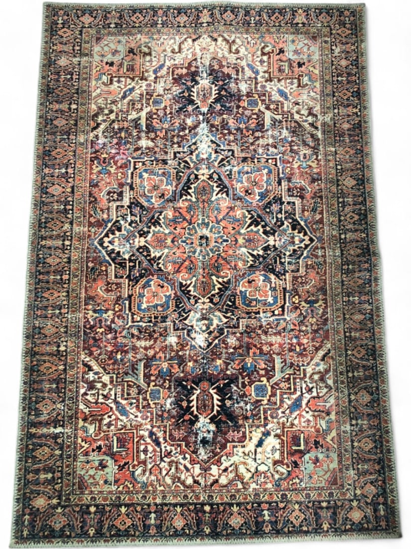 grandinroad Alanya 3'6" x 5'6" Clay Area Rug: grandinroad Alanya 3'6" x 5'6" Clay area rug. Crafted from 100% polyester, this machine-made rug features a distressed traditional pattern in terracotta, blue, and cream tones. It has a woven backing 