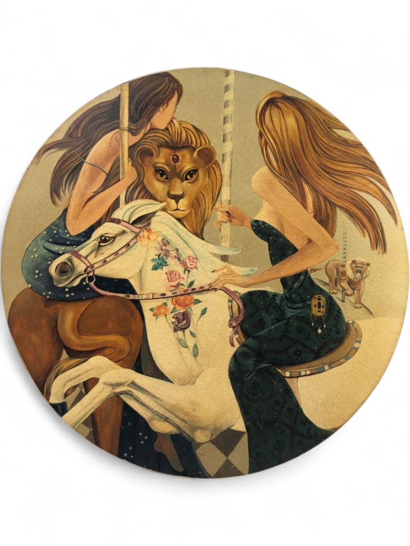 Miriam Bransky Carousel Print on Canvas: Circular carousel-themed print on canvas by Miriam Bransky. The artwork features two women riding a carousel with a lion and a white horse decorated with floral motifs. Signed 'Miriam Bransky' along t