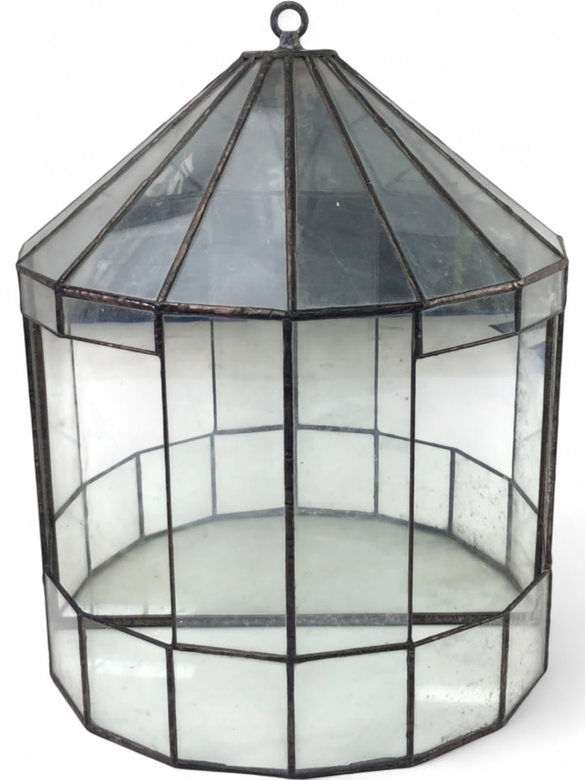 Stained Glass and Mirror Wall Terrarium: Stained glass wall-mounted terrarium or display case with a mirrored back. Constructed with clear glass panels and leaded solder seams. Features a flat back for wall mounting with an integrated hangin