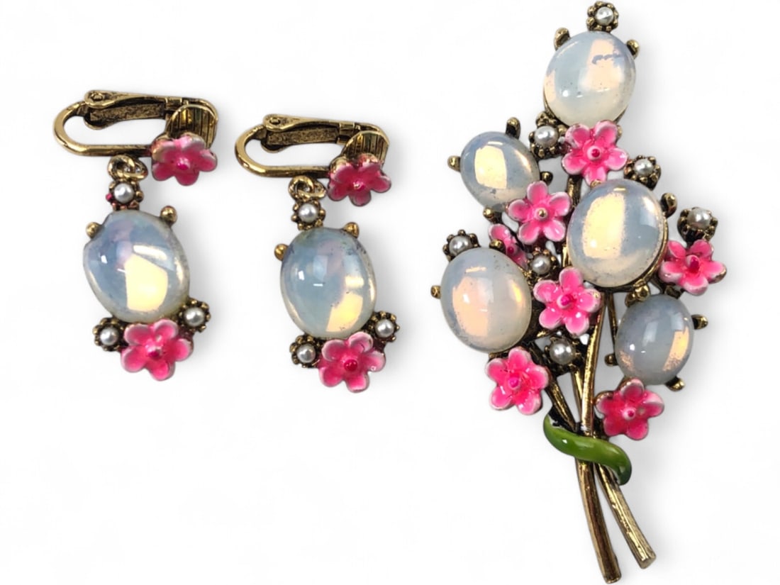 Art Moonstone Style and Enamel Floral Jewelry Set: Matching jewelry set by Art featuring a floral bouquet brooch and a pair of clip-on earrings. The pieces are crafted with gold-tone metal, accented with moonstone-style glass cabochons, pink enamel fl