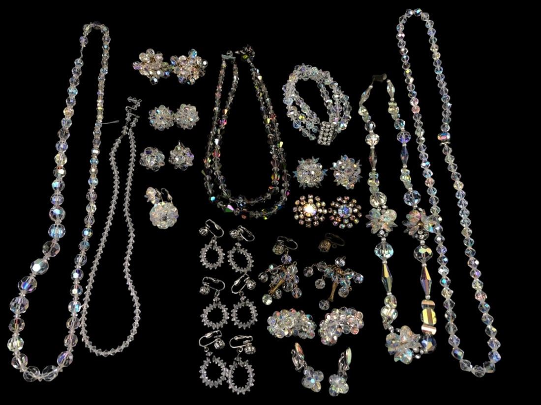 Laguna and Aurora Borealis Crystal Jewelry Lot: Large collection of vintage aurora borealis and clear faceted crystal bead jewelry. Includes several multi-strand and single-strand necklaces, a triple-strand bracelet with rhinestone clasp, and vario