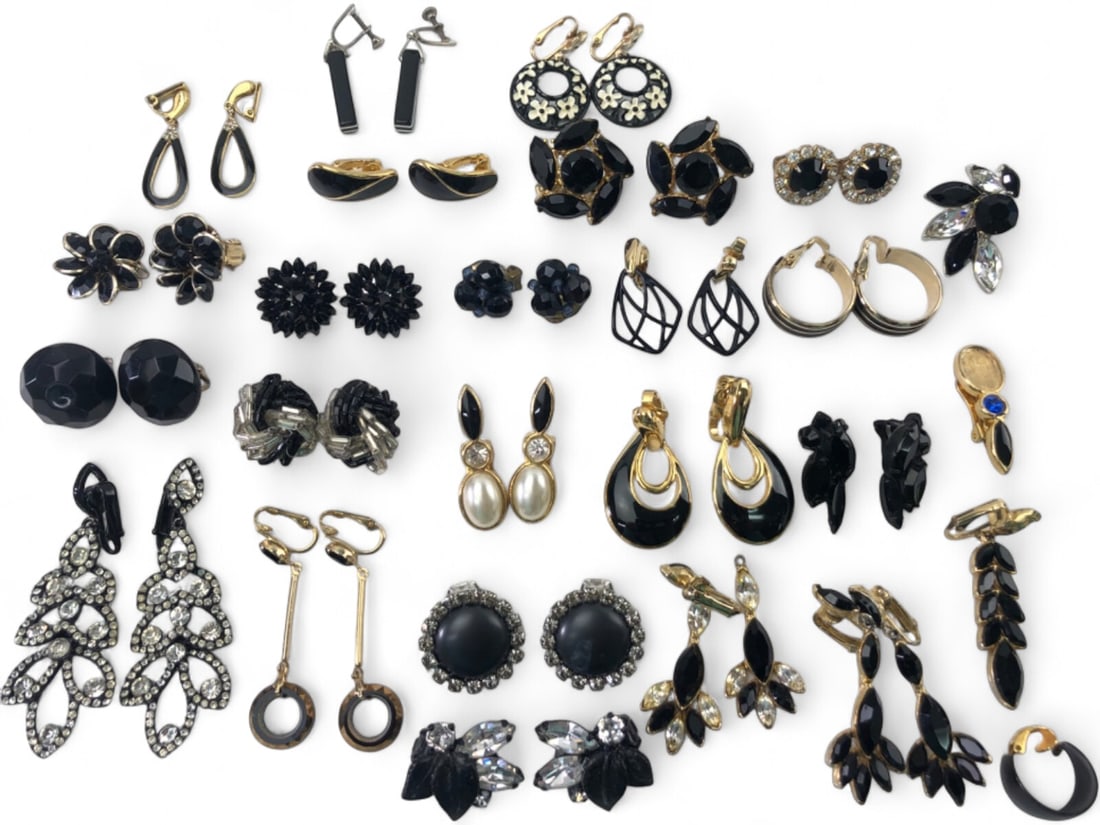 Trifari and Assorted Vintage Black Accent Jewelry: Large collection of vintage costume jewelry featuring black accents. Includes a pair of Trifari gold-tone and black enamel door knocker earrings with maker's mark. Lot also contains various clip-on an