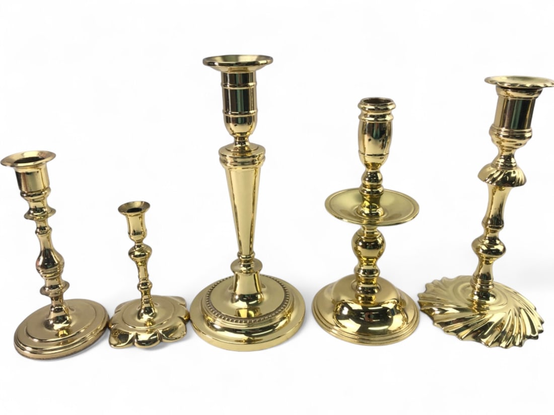 VTG Baldwin Brass Candle Holders, Set of 5: Set of five vintage Baldwin brass candle holders in various traditional styles. Includes one Historic Charleston Reproductions piece with a scalloped base and palm tree mark, and one Smithsonian Insti