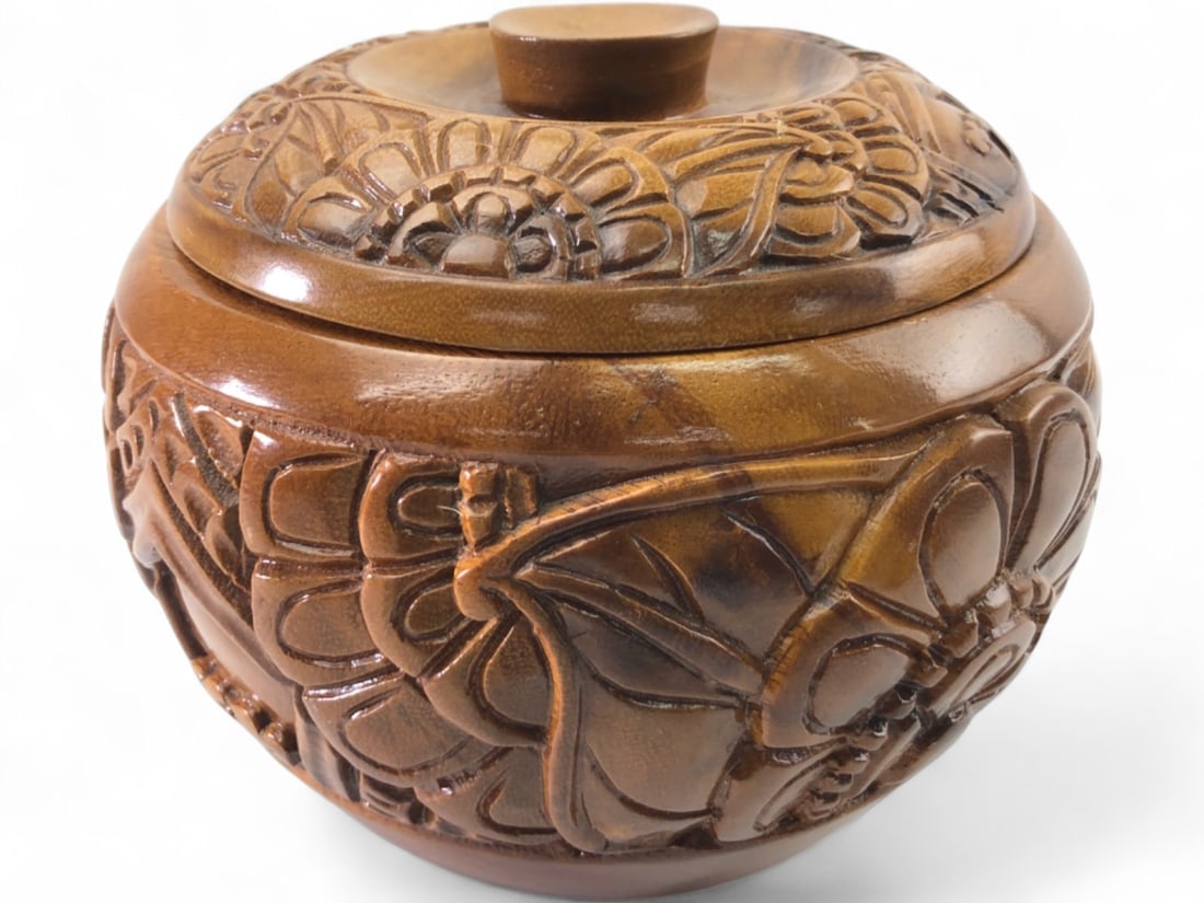 Waikiki Woods Monkey Pod Carved Wood Bowl with Lid: Carved monkey pod wood bowl with matching lid, made by Ledesma & Sons for Waikiki Woods, Inc. Features a deep relief floral and butterfly motif. Base retains original manufacturer labels from the