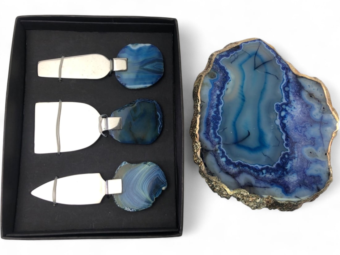 Blue Agate and Silver Tone Cheese Plate and Knife Set: Four-piece cheese service set featuring a blue dyed agate cheese plate with a silver-toned metallic edge and three coordinating cheese knives with blue agate handles. The set includes a narrow plane k